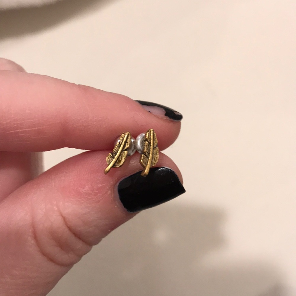 Gold feather stud earrings